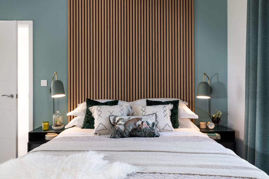 Sustainable acoustic panelling behind double bed